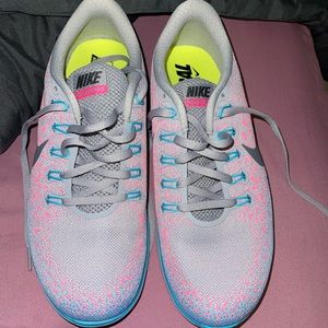 Nike shows grey blue and pink